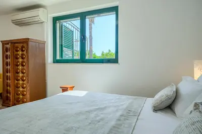 Krevet ili kreveti u jedinici u objektu Villa Rasotica Relaxing Villa with Heated Pool, Perfect for Families