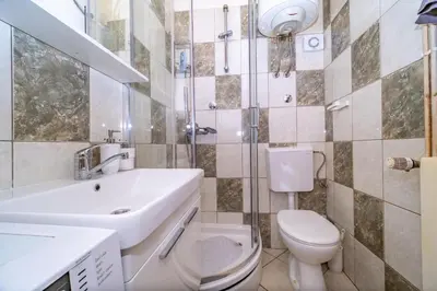Kupaonica u objektu Spacious apartment 50 m from the beach