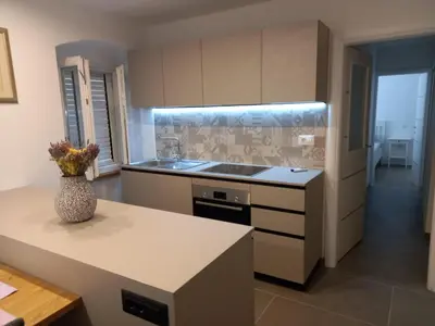 Kuhinja ili čajna kuhinja u objektu Aloha Guest House