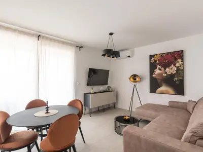 TV i/ili zabavni centar u objektu Apartment in Split near the Adriatic Coast