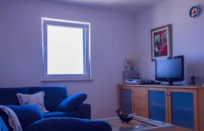 TV i/ili zabavni centar u objektu Molo Lozna Apartments