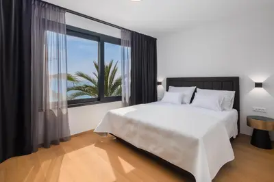 Krevet ili kreveti u jedinici u objektu Paoma Lux Beach Suites
