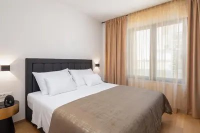 Krevet ili kreveti u jedinici u objektu Paoma Beach Penthouse Suite with jacuzzi
