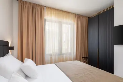 Krevet ili kreveti u jedinici u objektu Paoma Beach Penthouse Suite with jacuzzi