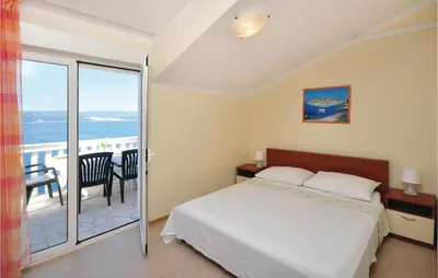 Krevet ili kreveti u jedinici u objektu Apartment Mimice With Sea View 380