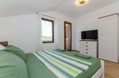 Krevet ili kreveti u jedinici u objektu Apartments Lada