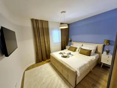 Krevet ili kreveti u jedinici u objektu Family-friendly apartments with swimming pool Podstrana - Split - 23526