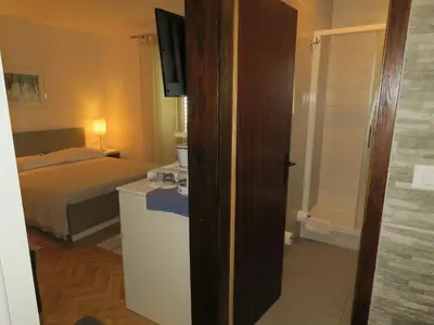 Krevet ili kreveti u jedinici u objektu Apartments Staničić