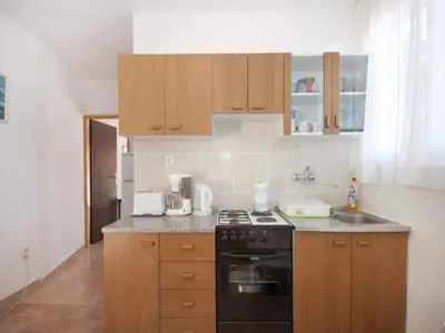 Kuhinja ili čajna kuhinja u objektu Apartments Mira -One Bedroom Apartment with Terrace and Sea View A1