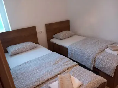 Krevet ili kreveti u jedinici u objektu Apartments Kalajzic - Two Bedroom Apartment with Garden and Terrace A2 ST
