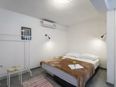 Krevet ili kreveti u jedinici u objektu Apartments Sonja - Studio Apartment ST