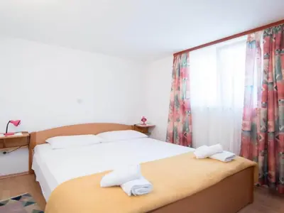 Krevet ili kreveti u jedinici u objektu Apartments Ana & Bogdan - Two Bedroom Apartment with Terrace A4 ST