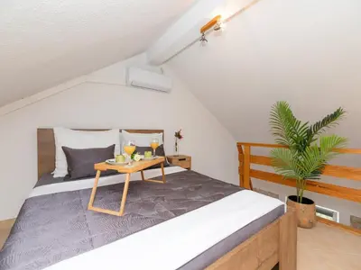Krevet ili kreveti u jedinici u objektu Apartments Tino- Two Bedroom Apartment with Terrace and Sea View A2