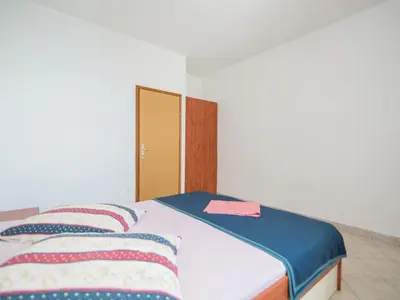Krevet ili kreveti u jedinici u objektu Apartments Neva- One Bedroom Apartment
