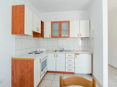 Kuhinja ili čajna kuhinja u objektu Apartments Neva- Standard Two Bedroom Apartment with Terrace and Sea View 4Z