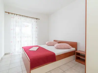 Krevet ili kreveti u jedinici u objektu Apartments Neva- Standard Two Bedroom Apartment with Terrace and Sea View 4Z