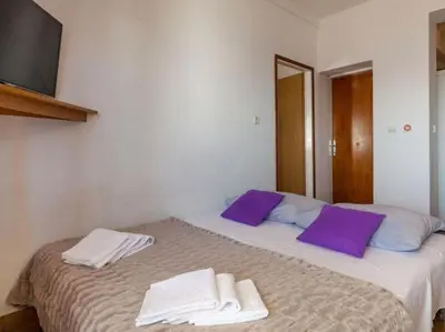 Krevet ili kreveti u jedinici u objektu Apartments Nena ST - One Bedroom Apartment with Terrace and Sea View A4