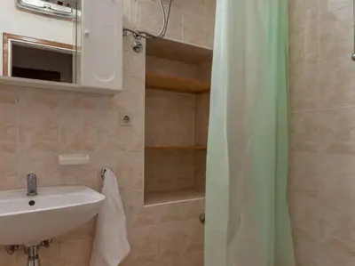 Kupaonica u objektu Apartments Nena ST - One Bedroom Apartment with Terrace and Sea View A4