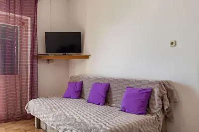 TV i/ili zabavni centar u objektu Apartments Nena ST - One Bedroom Apartment with Terrace and Sea View A4