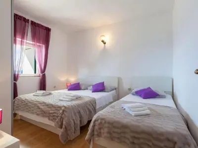 Krevet ili kreveti u jedinici u objektu Apartments Nena ST - One Bedroom Apartment with Terrace and Sea View A4