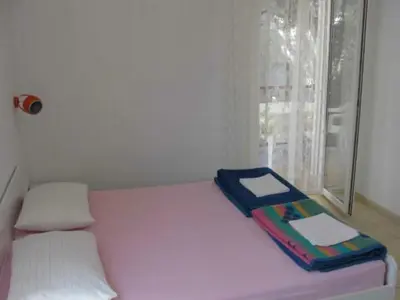 Krevet ili kreveti u jedinici u objektu Apartments Boguvila - Two-Bedroom Economy Apartment with Terrace A5 - ST