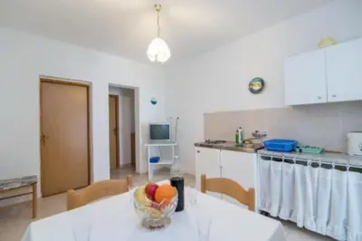 Kuhinja ili čajna kuhinja u objektu Apartments Boguvila - Two-Bedroom Standard Apartment with Terrace A6 - ST