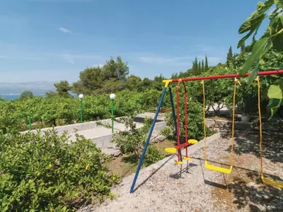 Dječje igralište u objektu Holiday Home Blossom - Four Bedroom Holiday Home with Outdoor Pool and Jacuzzi - ST