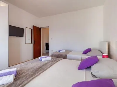 Krevet ili kreveti u jedinici u objektu Apartments Nena ST - One Bedroom Apartment with Balcony and Sea View A1