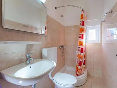Kupaonica u objektu Apartments Nena ST - One Bedroom Apartment with Balcony and Sea View A1