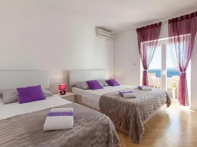 Krevet ili kreveti u jedinici u objektu Apartments Nena ST - One Bedroom Apartment with Balcony and Sea View A1