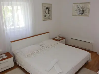 Krevet ili kreveti u jedinici u objektu Holiday House Granny Mary - Two Bedroom Holiday Home ST