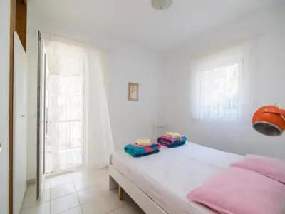 Krevet ili kreveti u jedinici u objektu Apartments Boguvila - Two-Bedroom Family Apartment with Terrace A2 - ST
