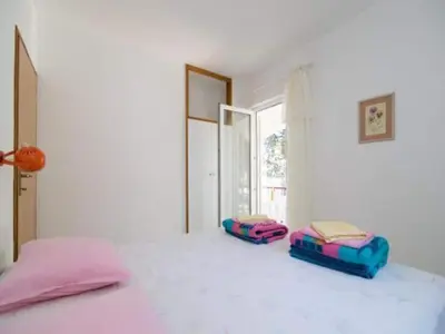 Krevet ili kreveti u jedinici u objektu Apartments Boguvila - Two-Bedroom Family Apartment with Terrace A2 - ST