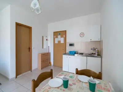 Kuhinja ili čajna kuhinja u objektu Apartments Boguvila - Studio with Terrace A4 - ST