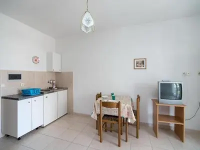 Kuhinja ili čajna kuhinja u objektu Apartments Boguvila - Studio with Terrace A4 - ST