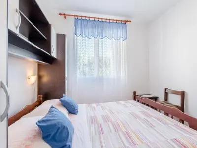 Krevet ili kreveti u jedinici u objektu Apartment Mia-Three Bedroom Apartment with Sea View Terrace