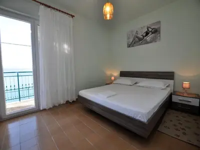 Krevet ili kreveti u jedinici u objektu House Karlo Apartments - One-Bedroom Apartment with Terrace and Sea View A1