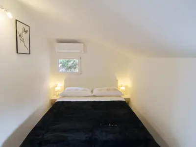 Krevet ili kreveti u jedinici u objektu Holiday Home Bliss - Holiday Home with Outdoor Pool and Sea View ST
