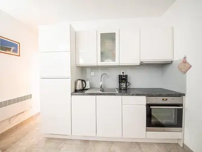 Kuhinja ili čajna kuhinja u objektu Apartments Magdalena - Standard Apartment with Terrace and Sea View A2