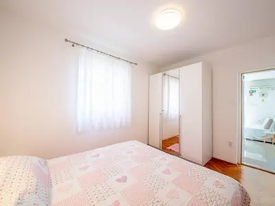 Krevet ili kreveti u jedinici u objektu Apartments Magdalena - Standard Apartment with Terrace and Sea View A2