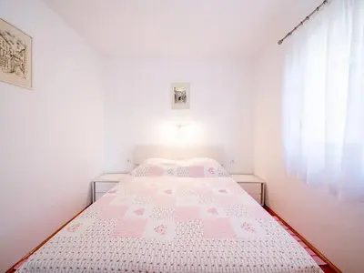 Krevet ili kreveti u jedinici u objektu Apartments Magdalena - Standard Apartment with Terrace and Sea View A2