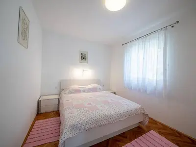 Krevet ili kreveti u jedinici u objektu Apartments Magdalena - Standard Apartment with Terrace and Sea View A2
