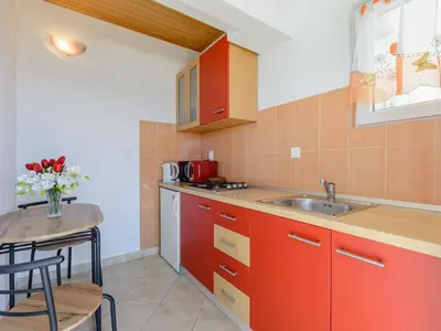 Kuhinja ili čajna kuhinja u objektu Rooms Sani- Double Room with Terrace and Sea View S2