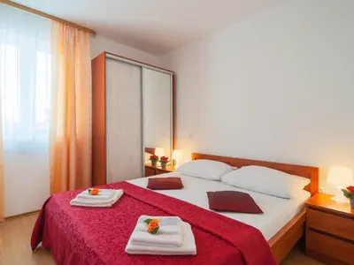 Krevet ili kreveti u jedinici u objektu Apartments Island Beat - Two Bedroom Apartment with Balcony A3 ST