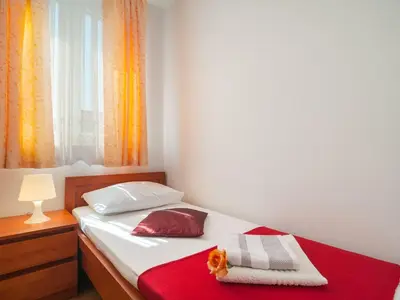 Krevet ili kreveti u jedinici u objektu Apartments Island Beat - Two Bedroom Apartment with Balcony A3 ST