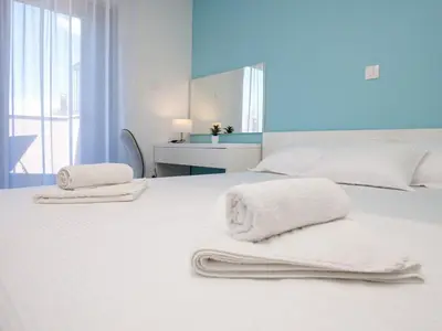 Krevet ili kreveti u jedinici u objektu Apartments Dva Galeba - One Bedroom Apartment with Garden Terrace 202