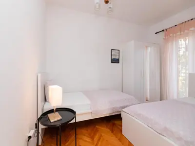 Krevet ili kreveti u jedinici u objektu Apartments Marti - Four Bedroom Apartment with Terrace and Sea View - ST