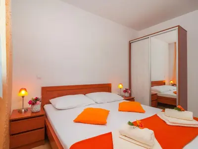 Krevet ili kreveti u jedinici u objektu Apartments Island Beat - One Bedroom Apartment with Balcony and Sea View A7 ST