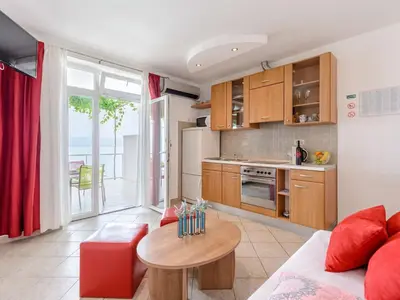 Kuhinja ili čajna kuhinja u objektu Apartments Hope Dugi Rat - Comfort OneBedroom Apartment with Terrace and Sea View A1