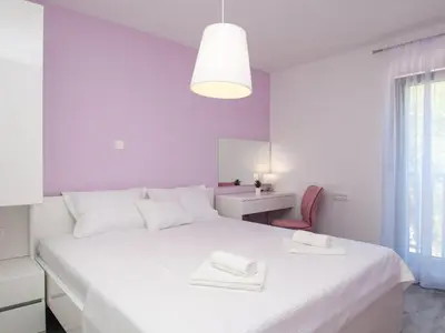 Krevet ili kreveti u jedinici u objektu Apartments Dva Galeba - Standard One Bedroom Apartment with Sea View 203